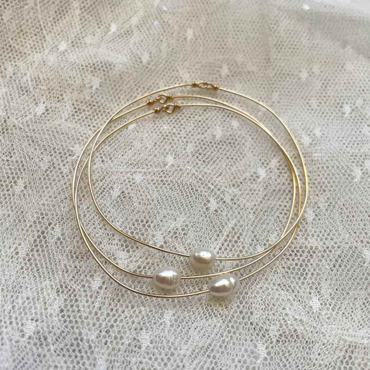 Bracelets joncs fins perles blanches