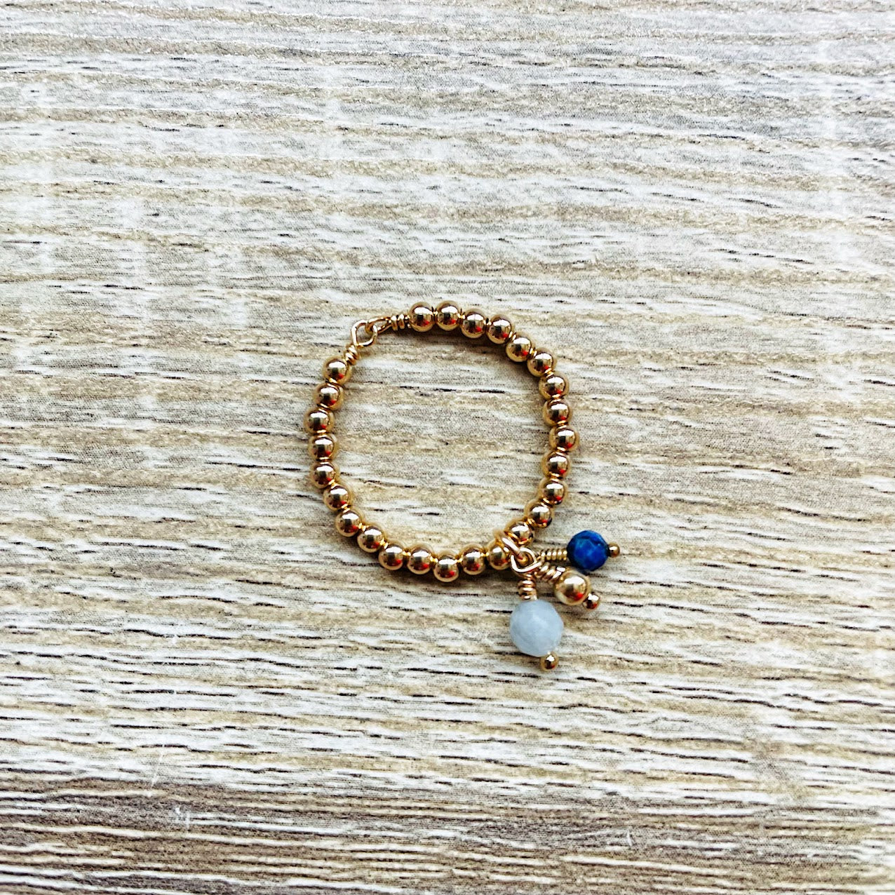bague-boules-aigue-marine-lapis-lazuli-plaque-or
