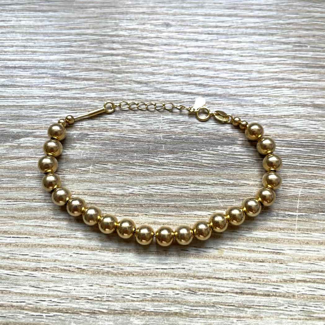 Bracelet grosses perles dorées