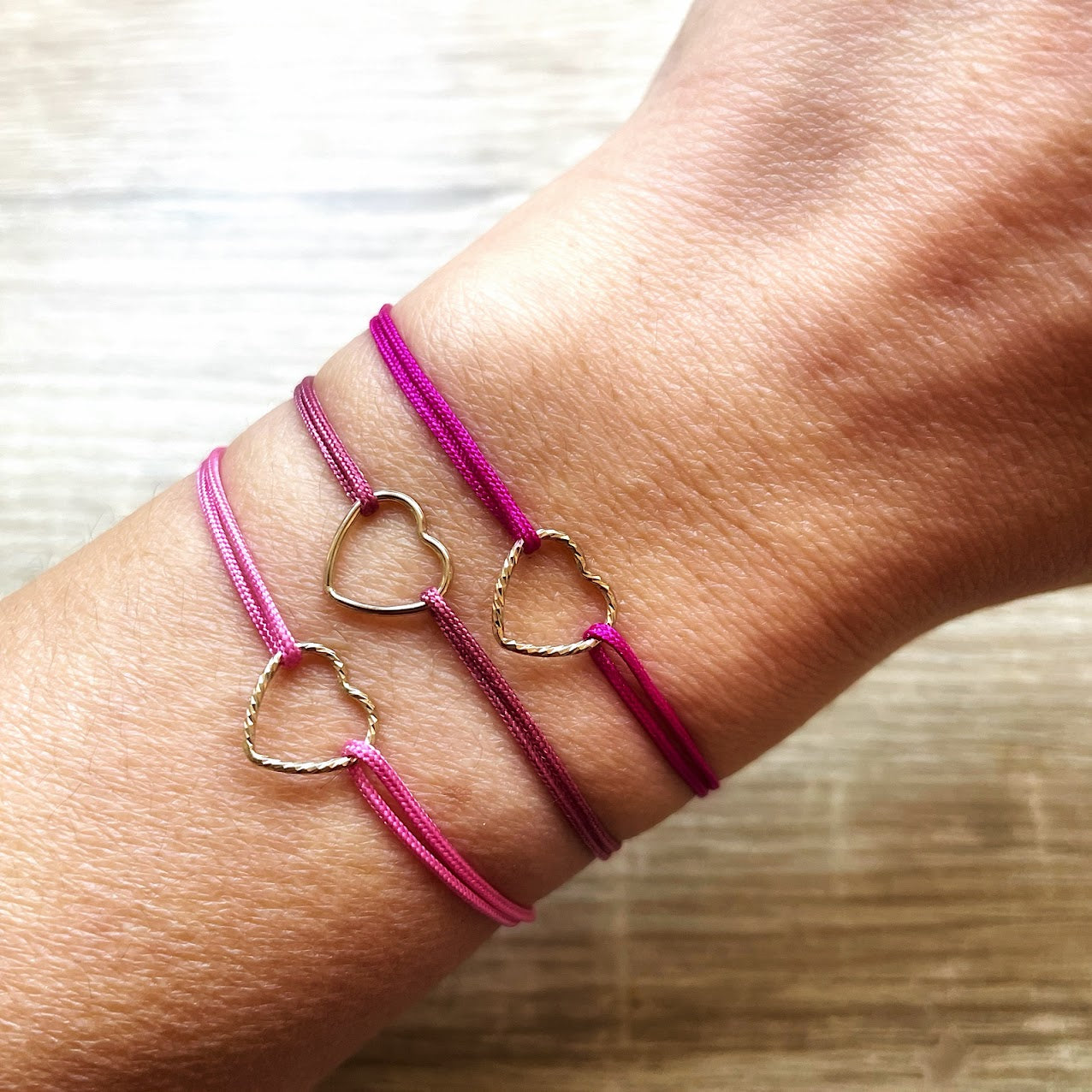 Bracelets cœur cordons roses