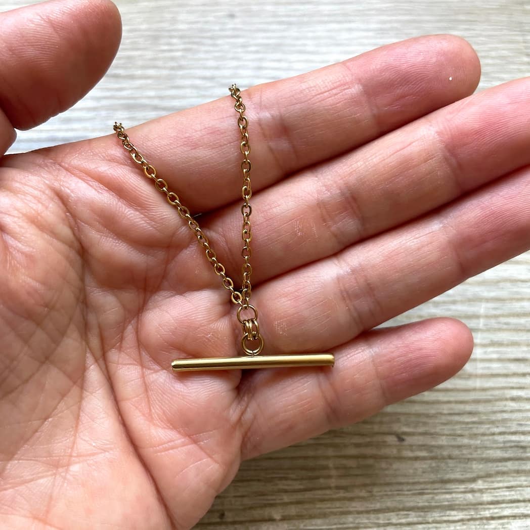 Collier barre T
