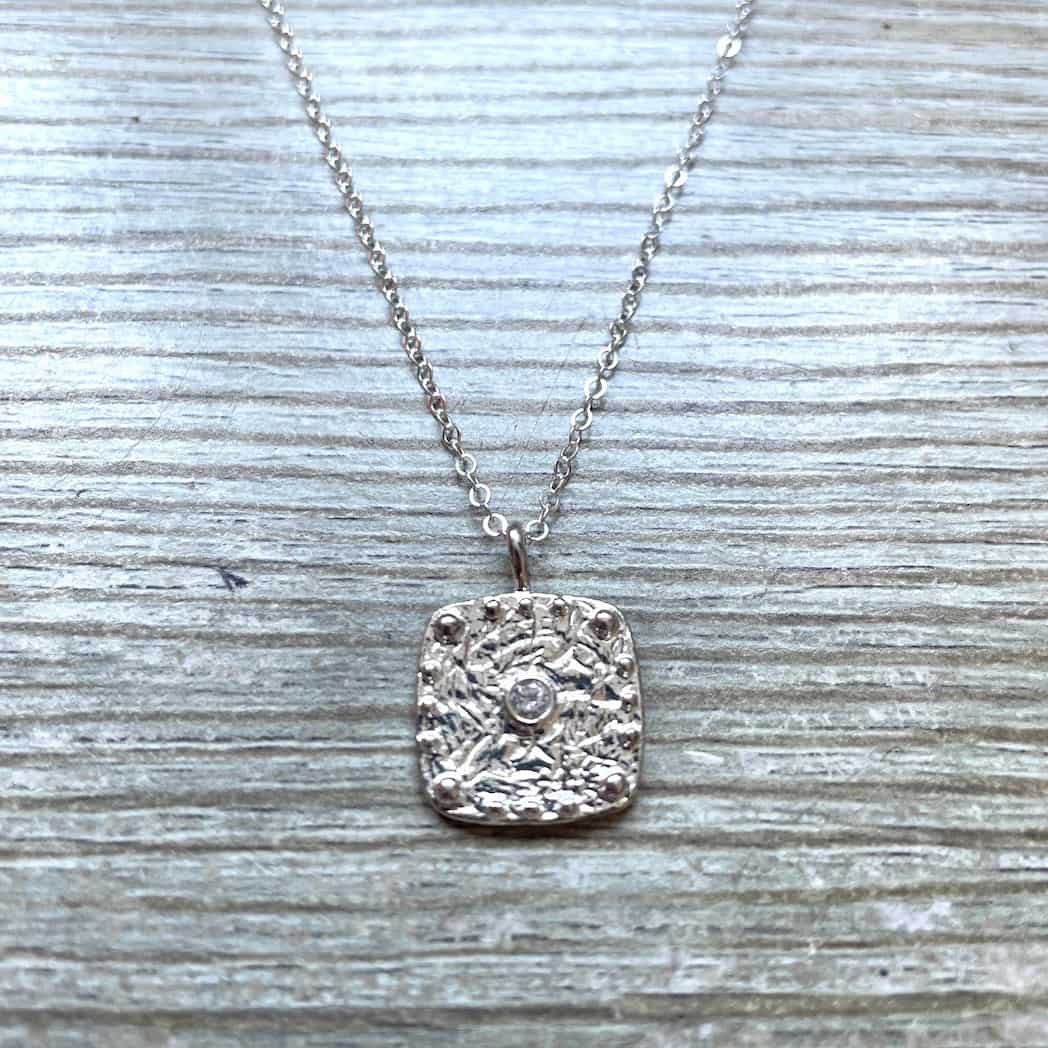 Collier médaille argent