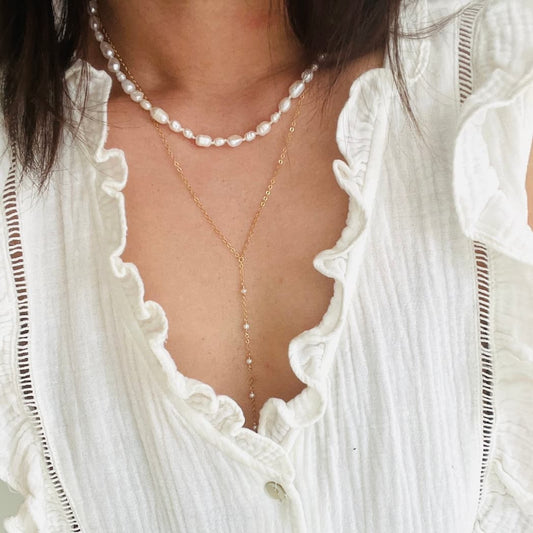 Ensemble de colliers perles blanches