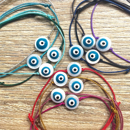     bracelet-cordon-coulissant-oeil-bleu-multicolore