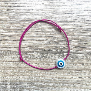    bracelet-cordon-coulissant-oeil-bleu-rose