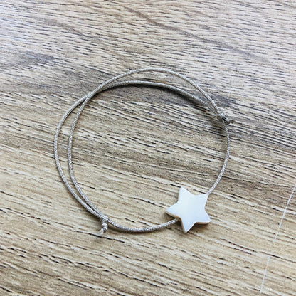 Bracelet enfant nacre cordon réglable argenté Camille