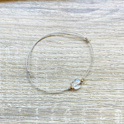 bracelet-cordon-reglable-cristal-roche-transparent-plaque-or