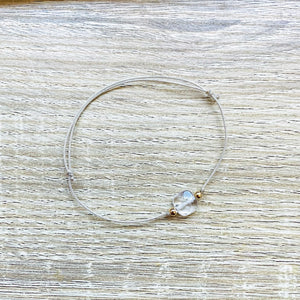 bracelet-cordon-reglable-cristal-roche-transparent-plaque-or